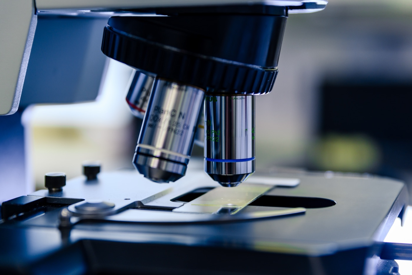 A close-up of microscope lenses
